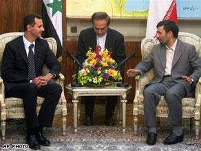 نجاد يجدد التمسك بالبرنامج النووي والأسد ينفي وساطة سورية