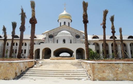 بوتين يفتتح بيت الحجاج الروسي في المغطس