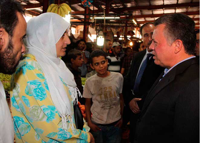شاهدوا صور زيارة الملك لسوق مخيم الحسين 