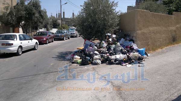  اربد تغرق بأكوام النفايات عشية العيد 