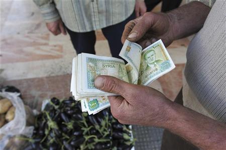 أموال المعارضة تنعش الليرة السورية
