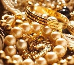 انخفاض أسعار الذهب بواقع دينار للغرام