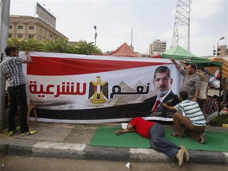 مساعد لمرسي: خير للرئيس أن يموت بدلا من أن يلومه التاريخ