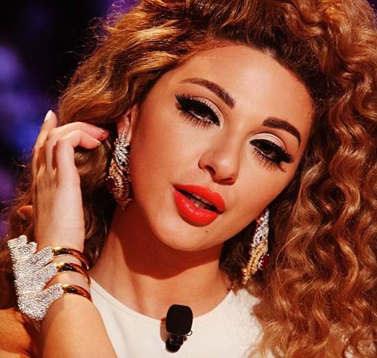 إطلالة مثيرة لميريام فارس بفستان أحمر .. صور