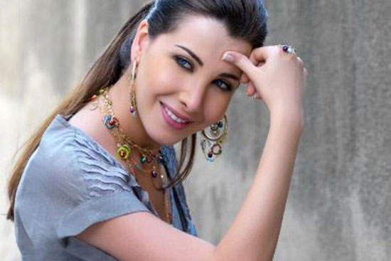 لغز صورة نانسي عجرم  ..  من يستطيع حله؟