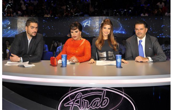 كم دفعت أحلام لكي تطيح براغب علامة  من أراب أيدول ؟- صور