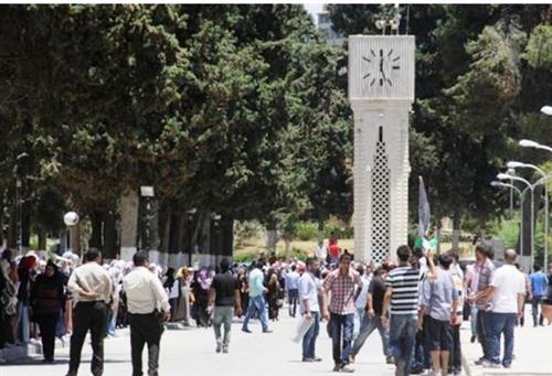 مشاجرة بالأردنية ..  ومسدس يرعب الطلبة