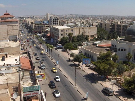 إزالة اعتداءات مطاعم ومحلات على ارصفة اربد 