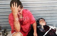 ام فلسطينية تستشهد بين يدي طفلها  ..  شاهد الصور 