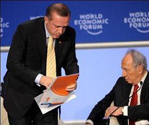 رئيس الوزراء التركي ينسحب من جلسة بيريز في دافوس لاجل غزة
