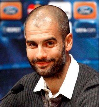 برشلونة يجدد عقد مدربه جوارديولا لعام واحد