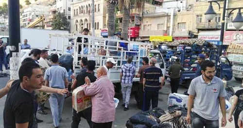 إربد تواصل إغاثة نازحي درعا 